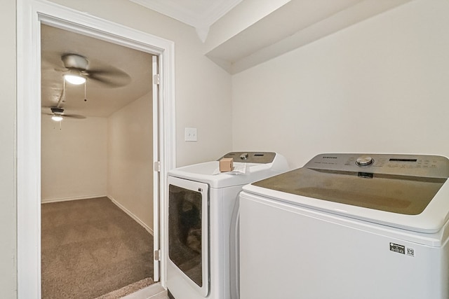 washroom with ceiling fan, washing machine and dryer, carpet floors, and ornamental molding