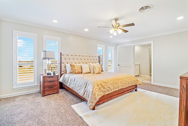 bedroom featuring ceiling fan, light colored carpet, and ornamental molding