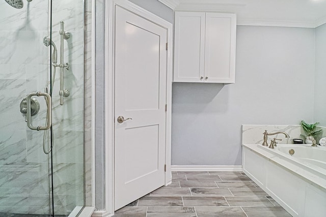 bathroom featuring plus walk in shower and ornamental molding