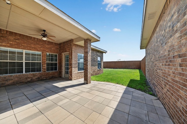 29 Vista Crest Ct, Odessa, TX 79762 - fenced backyard featuring ceiling fan and a patio area