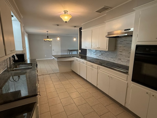 kitchen with black appliances, a sink, decorative backsplash, light tile patterned floors, and under cabinet range hood