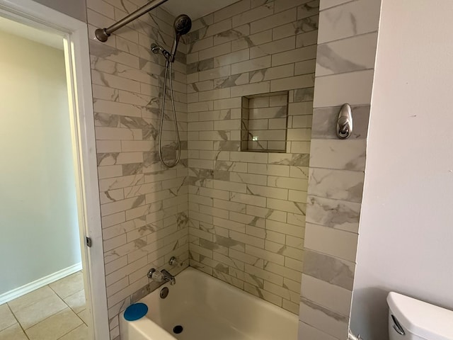 bathroom with toilet, tub / shower combination, and tile patterned floors