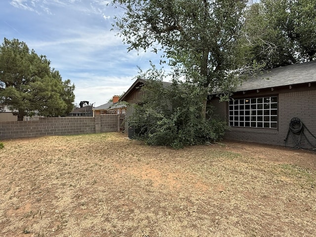 view of yard with fence