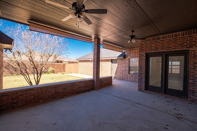 view of patio featuring a fenced backyard and a ceiling fan