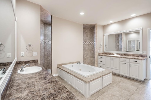 bathroom with vanity and a bathing tub