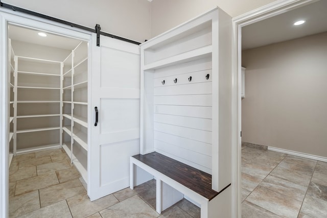 mudroom with a barn door