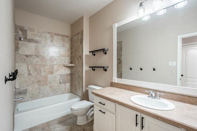 full bathroom with toilet, vanity, tile patterned flooring, and tiled shower / bath combo