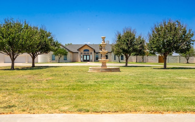 view of front of property with a front lawn