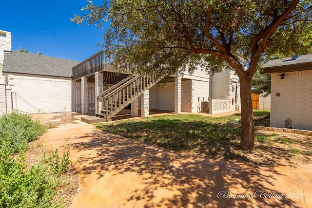 exterior space with a wooden deck