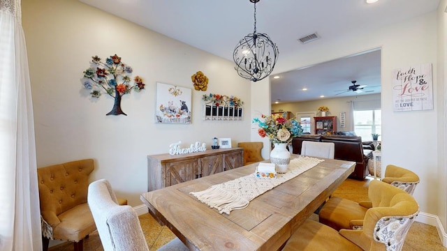 dining area with baseboards, visible vents, ceiling fan with notable chandelier, and recessed lighting