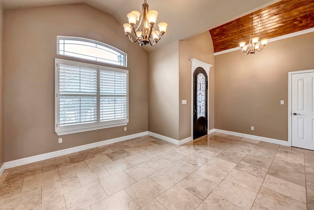 foyer featuring vaulted ceiling and an inviting chandelier