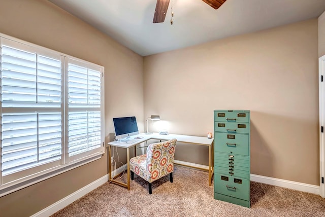 home office featuring carpet and ceiling fan