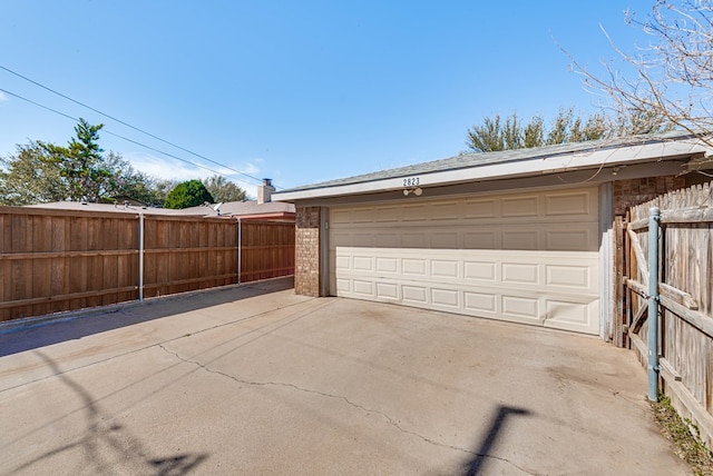 detached garage with fence