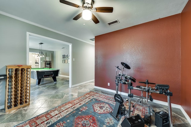 exercise area featuring ornamental molding, visible vents, billiards, and baseboards