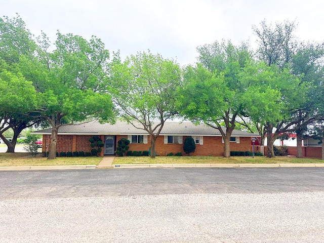 312 N Main St, Coahoma, TX 79511 - ranch-style house with brick siding