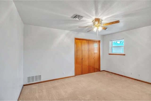 312 N Main St, Coahoma, TX 79511 - unfurnished bedroom featuring a closet, carpet floors, visible vents, and baseboards