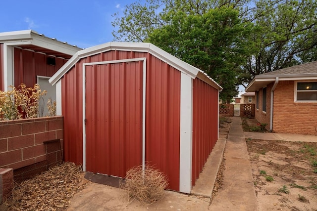 312 N Main St, Coahoma, TX 79511 - view of shed featuring fence