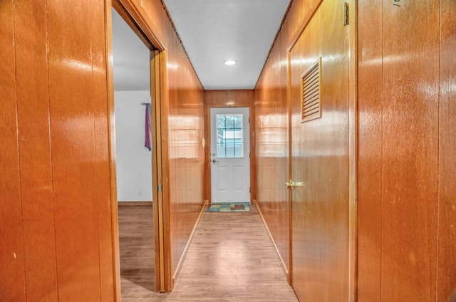 312 N Main St, Coahoma, TX 79511 - doorway to outside featuring wood finished floors and recessed lighting