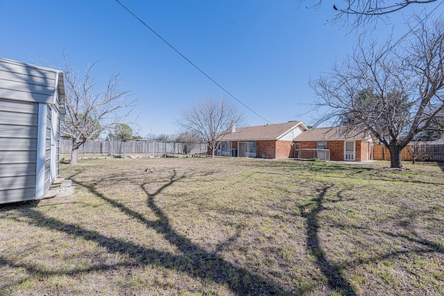 view of yard with fence