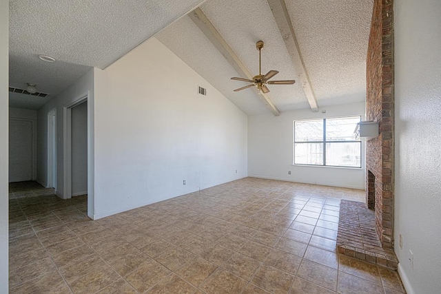 unfurnished room featuring visible vents, ceiling fan, vaulted ceiling with beams, a textured ceiling, and a fireplace