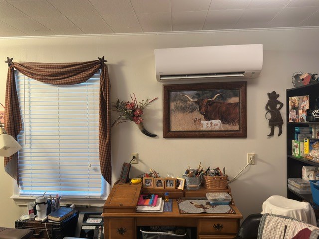 home office featuring an AC wall unit