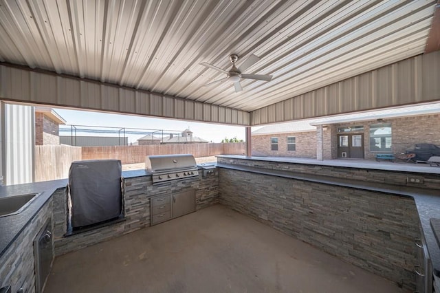 view of patio / terrace with a ceiling fan, fence, and area for grilling