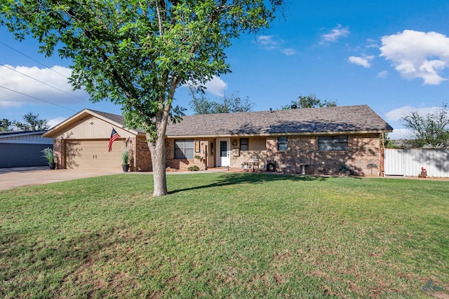 1412 Sparks St, Midland, TX 79701 - ranch-style home with brick siding, concrete driveway, and an attached garage