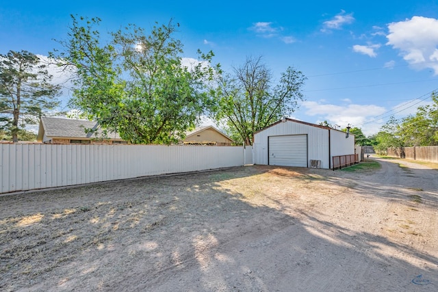 1412 Sparks St, Midland, TX 79701 - detached garage featuring dirt driveway