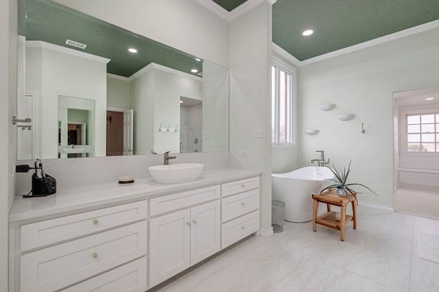 interior details featuring hardwood / wood-style floors, crown molding, and a tiled fireplace