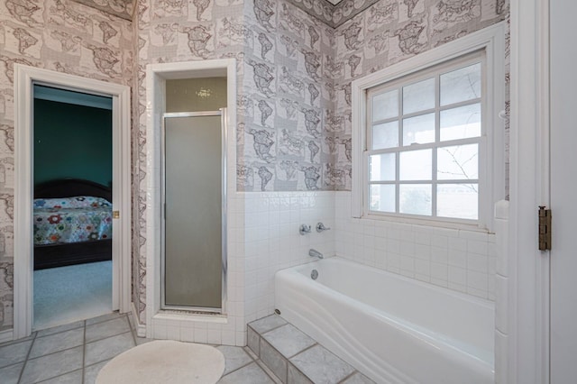 bathroom featuring vanity, tile patterned floors, a shower with door, and ornamental molding