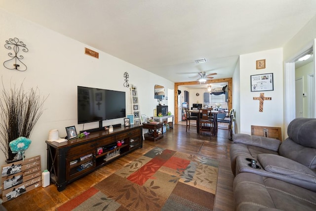 1101 Barnes Ave, Big Spring, TX 79720 - living area featuring wood finished floors and ceiling fan