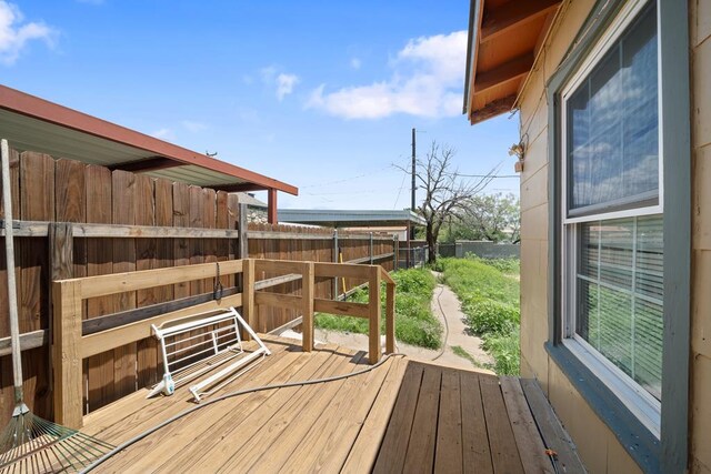 1101 Barnes Ave, Big Spring, TX 79720 - wooden deck featuring a fenced backyard