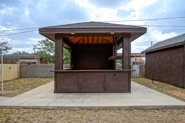 404W Jax Ave, Midland, TX 79701 - fenced backyard with a gazebo and a patio area
