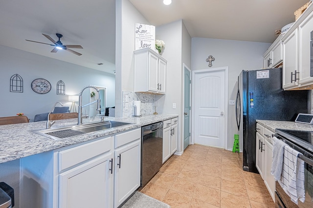 kitchen featuring range, black dishwasher, a sink, decorative backsplash, and white cabinetry