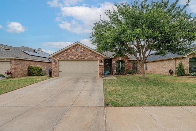 view of front facade featuring driveway, an attached garage, brick siding, and a front lawn
