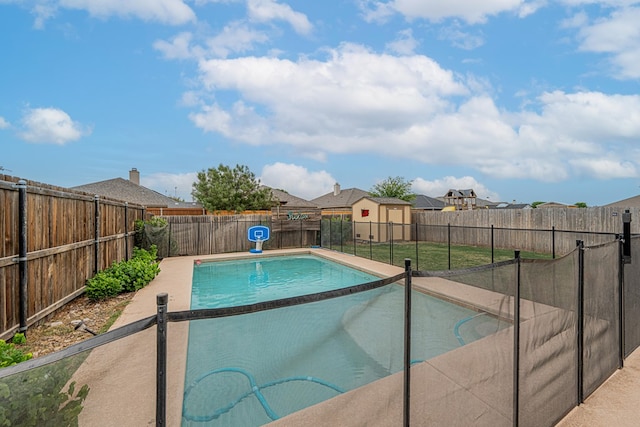 view of swimming pool featuring a fenced backyard