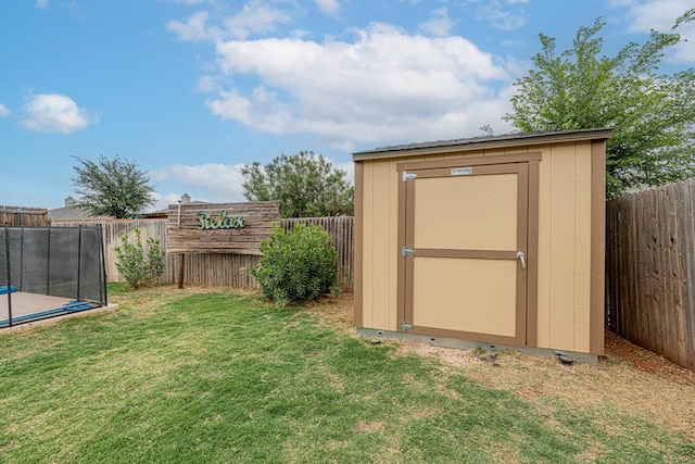 view of shed with a trampoline