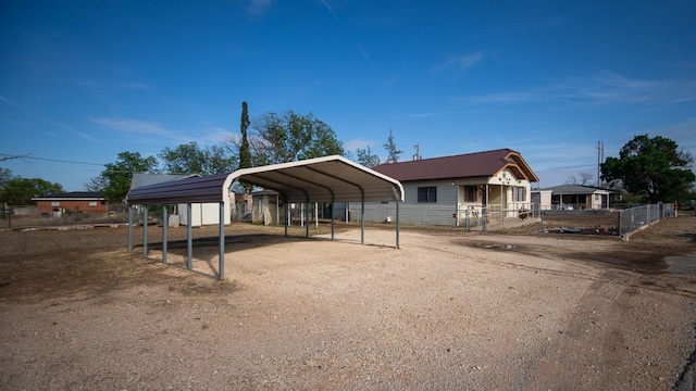 view of front of house featuring a carport