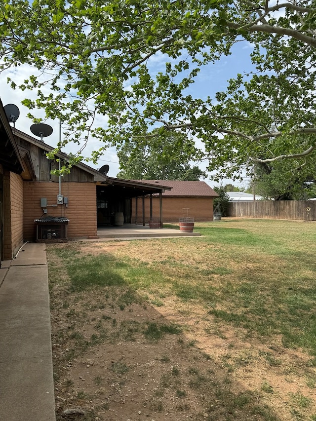 view of yard featuring fence