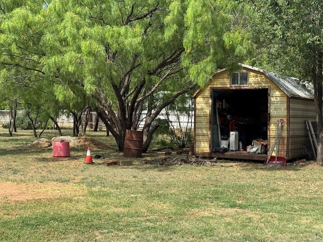 view of yard with a storage shed and an outdoor structure