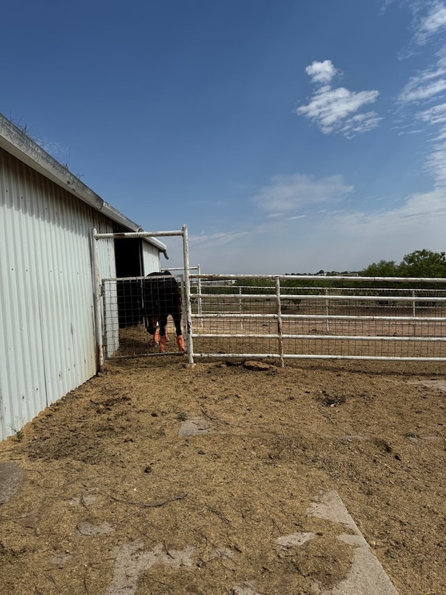view of yard with an exterior structure and an outdoor structure