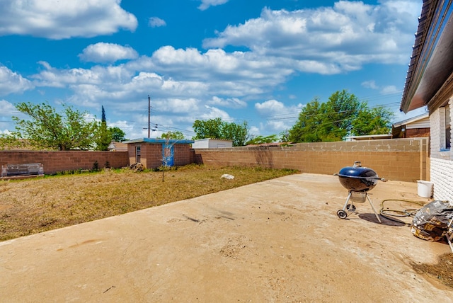 2724 E 11th St, Odessa, TX 79761 - view of yard with a storage unit, a patio, an outdoor structure, and a fenced backyard