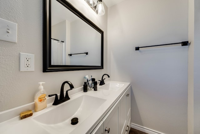 2724 E 11th St, Odessa, TX 79761 - bathroom with double vanity and a sink