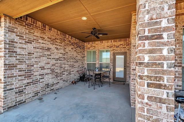 view of patio / terrace featuring ceiling fan