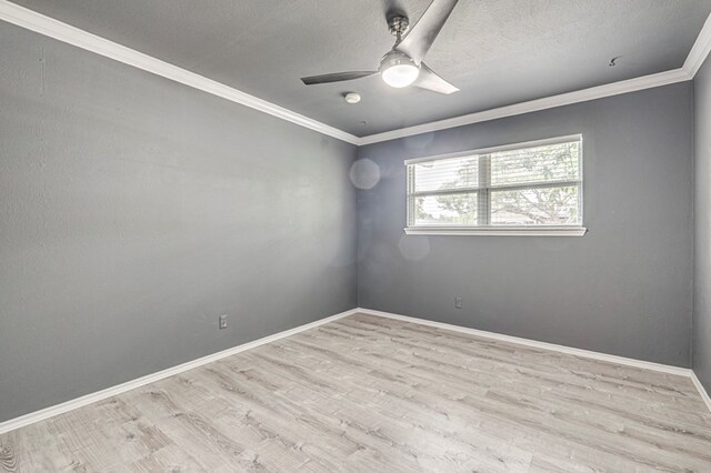 empty room with crown molding, a ceiling fan, a textured ceiling, and wood finished floors