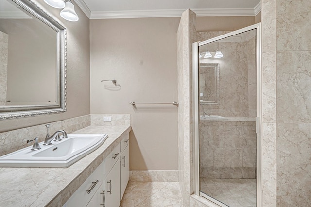 bathroom featuring crown molding, a stall shower, and vanity
