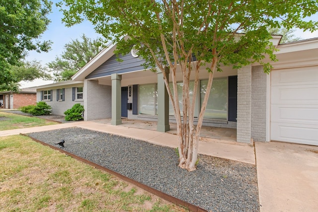 ranch-style home with brick siding