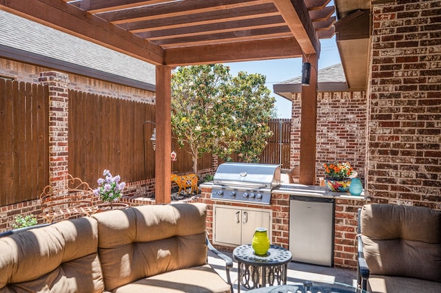 5319 Half Moon Cir, Midland, TX 79707 - view of patio / terrace with area for grilling, an outdoor kitchen, and fence