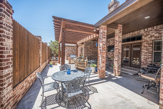 5319 Half Moon Cir, Midland, TX 79707 - view of patio / terrace with french doors, a fenced backyard, a pergola, and outdoor dining space