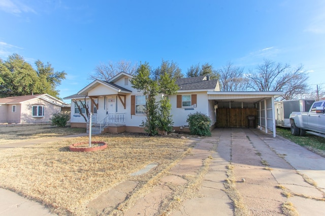 view of front of house with a carport